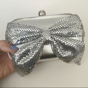Bebe Silver Bow Clutch